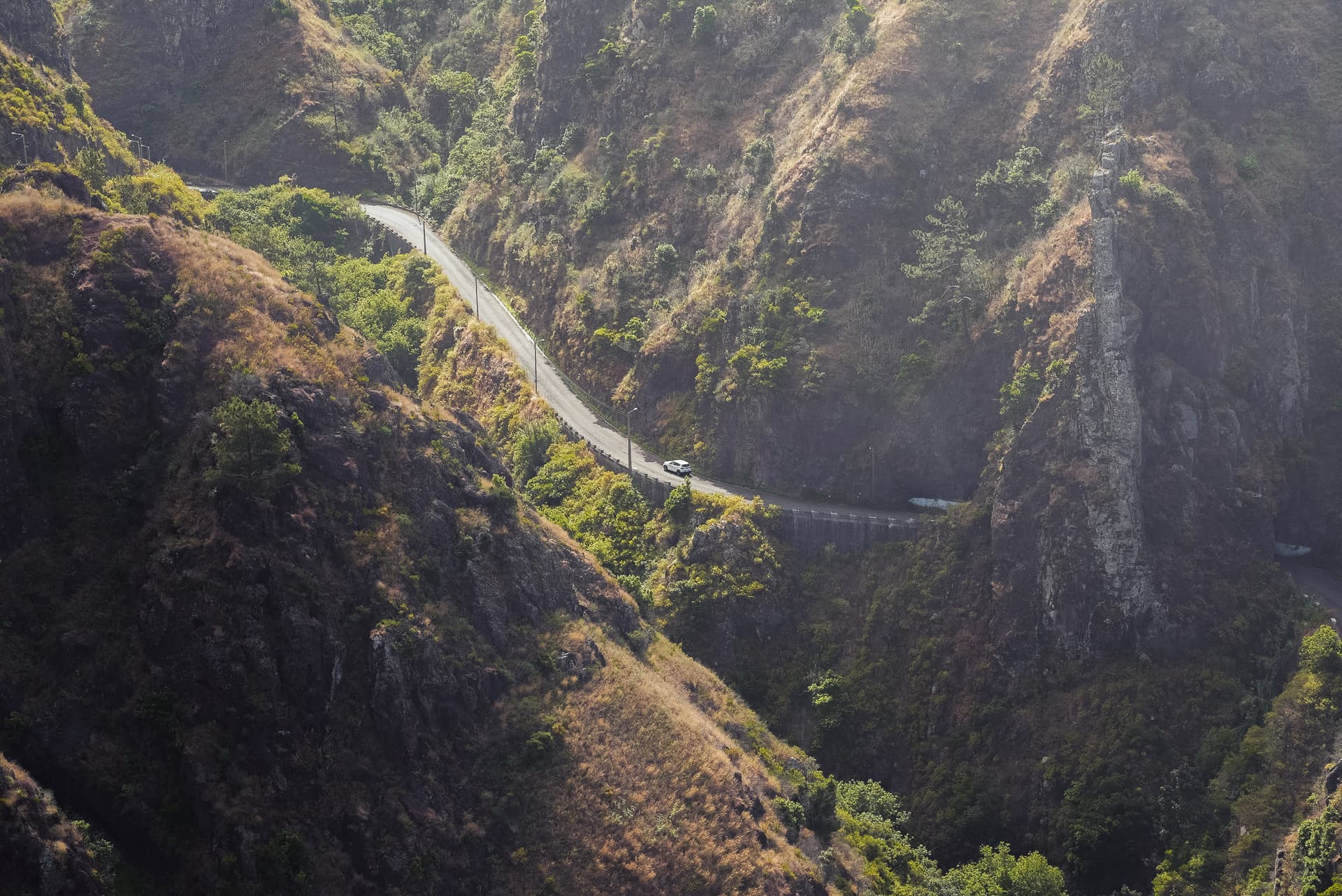Winding road through mountainous landscape.
